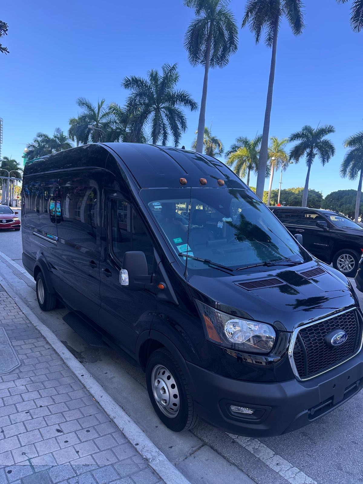 Front three-quarter view of the black Ford Transit used by Montero Transportation Services